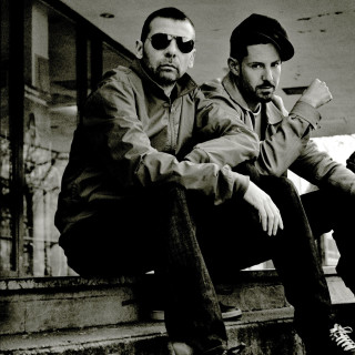 Two men sitting ledge sunglasses - sunglass and a hat free wallpaper