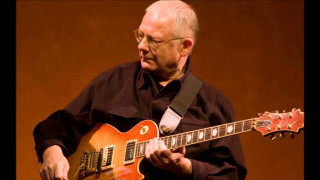 Man playing guitar on stage 6 - eric peterson free wallpaper