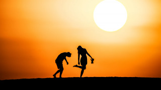 Couple people dirt sunset sky - a kite free wallpaper