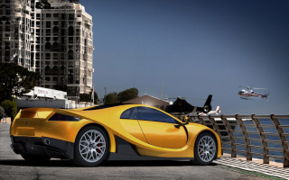 Yellow sports car city road - luxury free wallpaper
