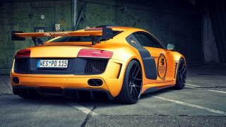 Yellow sports car green wall - a yellow sports car free wallpaper