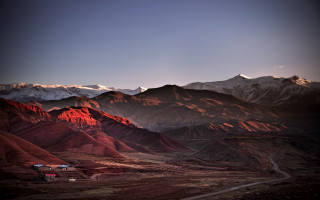 Mountain road house background winding - a mountain range in the background free wallpaper