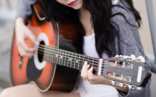 Woman guitar bench outside gray - a woman playing free wallpaper