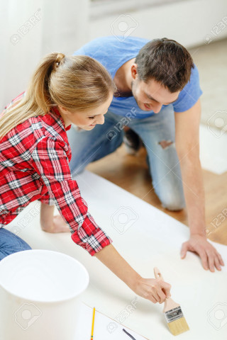 Man woman painting wall together - a man and woman free wallpaper