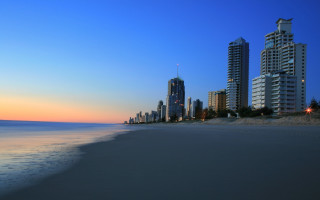 Beach city sunset clouds buildings - a few building free wallpaper