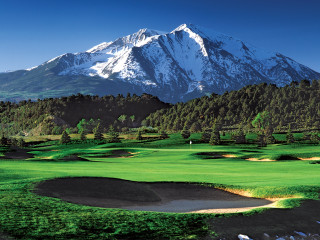 Golf course mountain green field - a green field in the foreground free wallpaper