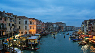 River boats buildings nighttime lights - both side of it free wallpaper