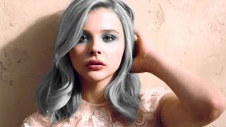 Grey haired blue eyed woman - grey background free wallpaper