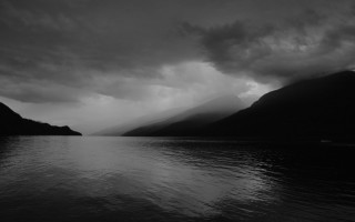 Lake mountains cloudy sky black - moody free wallpaper