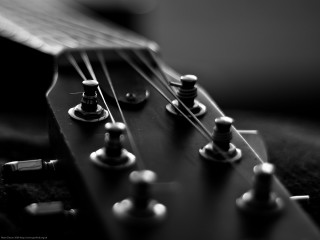Guitar neck closeup strings knobs 2 - a close up of a guitar neck free wallpaper
