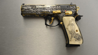 Gold black gun design handle - a gold free wallpaper