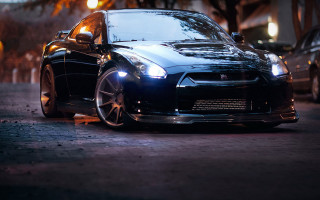 Black car parked night person - andrew law free wallpaper