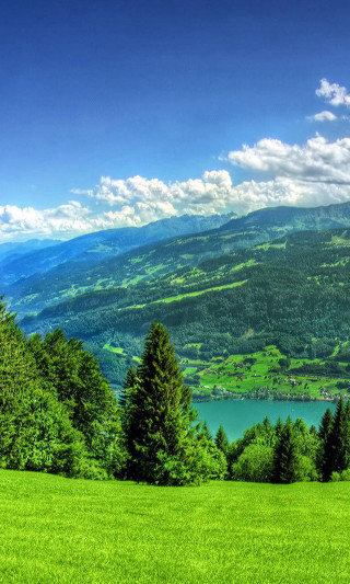 Scenic lake mountains grassy field - beautiful landscape free wallpaper