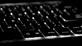 Keyboard closeup black background white 2 - a close up of a keyboard free wallpaper