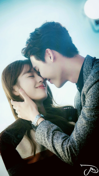 Man woman kiss sky clock - a sky background behind them free wallpaper