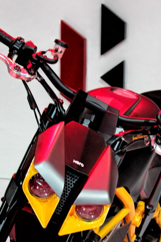 Red yellow motorcycle garage wall - a garage next free wallpaper