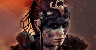 Woman horned headdress horns head - a fire in the background free wallpaper