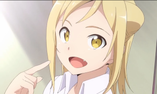 Blonde girl pointing finger mouth - her finger free wallpaper
