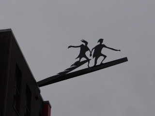 Couple people street light pole - arthouse free wallpaper