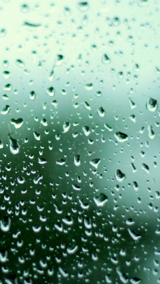 Rain covered window green sky - a few cloud free wallpaper