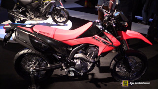 Red motorcycle black motorcycle showroom - a red motorcycle free wallpaper