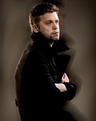 Man arms crossed serious look - his face and shoulders free wallpaper