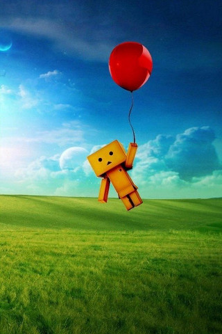 Red balloon floating grass yellow - a face free wallpaper