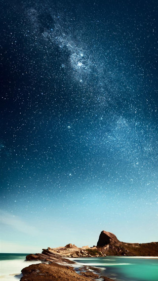 Night sky stars water rock - amir zand free wallpaper