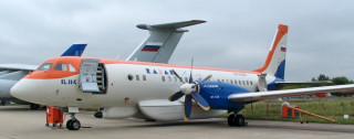 Small airplane parked runway airport - front view free wallpaper