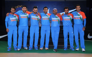 Men blue orange uniforms stage - a group of men free wallpaper