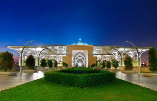 Building clock tower green lawn - a green lawn in front free wallpaper