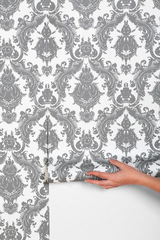 Person holding paper wallpaper grey - detail free wallpaper