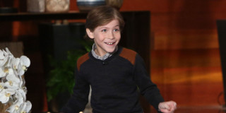 Young boy smiling flower arrangement - a vase of flowers free wallpaper