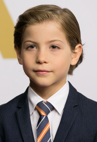 Young boy suit tie serious - a suit free wallpaper