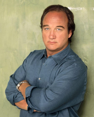 Man arms crossed leaning wall - against free wallpaper