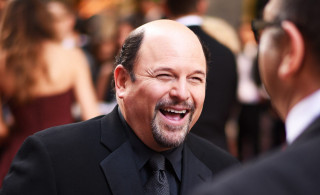 Formal suit man laughing blurry - other person free wallpaper