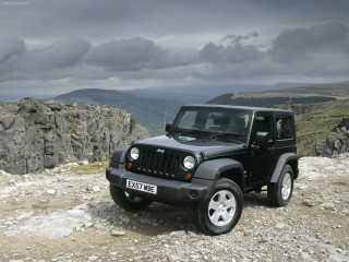 Black jeep rocky hillside mountains - a black jeep free wallpaper
