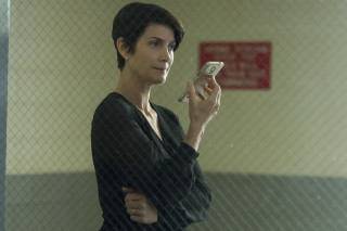Woman holding cell phone serious - ada gladys killins free wallpaper
