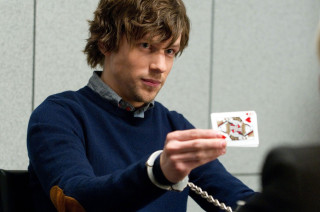 Man holding card table woman - a woman in the background free wallpaper