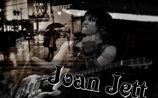 Woman holding guitar window sign - punk art free wallpaper