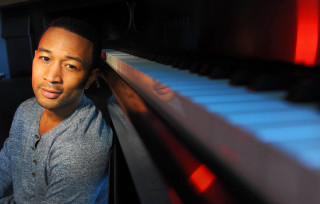 Man leaning piano smiling red - harlem renaissance free wallpaper