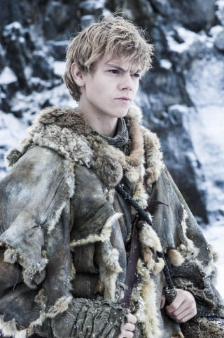 Man fur coat snow mountain - free winter wallpaper