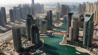 City river tall buildings boats - aerial free wallpaper