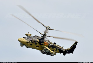 Helicopter flying blue sky propeller 2 - side and a propeller free wallpaper
