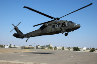 Helicopter flying low runway building - low free wallpaper