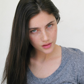 Woman long hair serious look 3 - a serious look free wallpaper