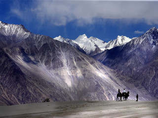 Horseback riders mountain snow blue - amir zand free wallpaper