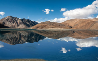Mountain range lake clouds sky 3 - a lake in the foreground free wallpaper
