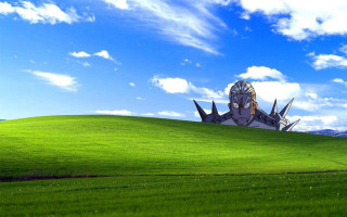 Green field building blue sky - a green field free wallpaper