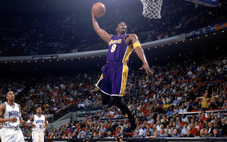 Man purple uniform dunking basketball 2 - the sideline free wallpaper
